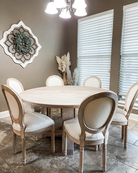 Madalinn Pedestal Table