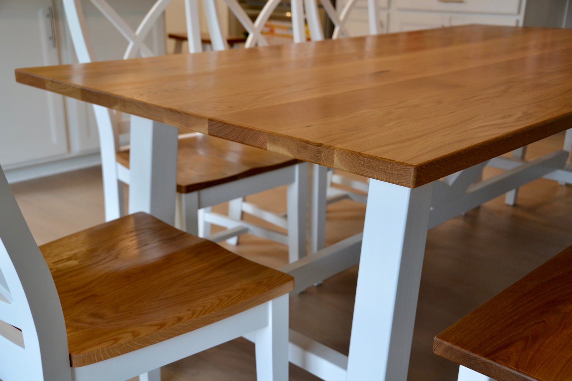 A dining table made out of solid white oak